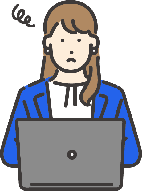 困った表情の女性がノートパソコンを使っている